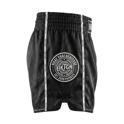 Short Muay Thai OKTAGON noir profil gauche medaillon brode